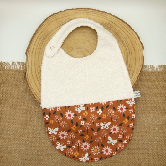 Bavoir fleurs et papillons