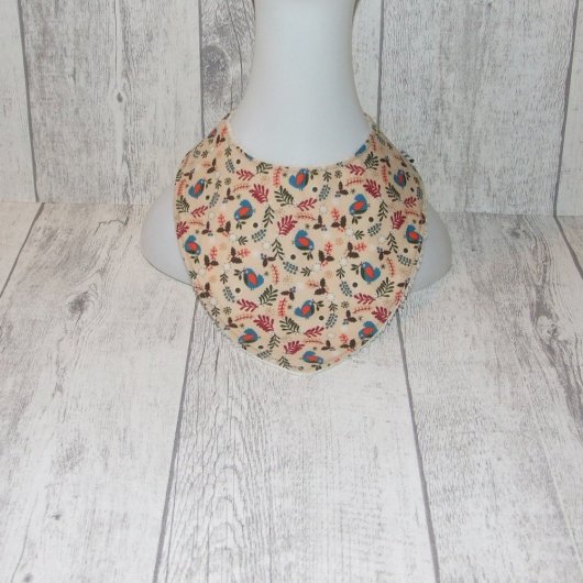 Bavoir bandana imprimé oiseaux et feuilles